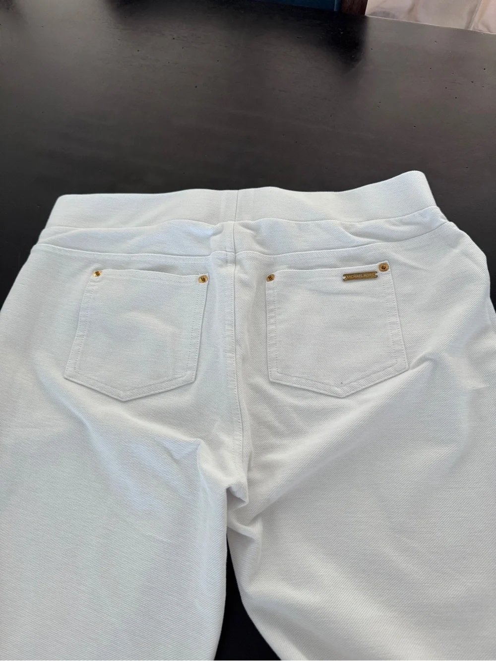 Michael Kors White pull up pants with Gold Detail